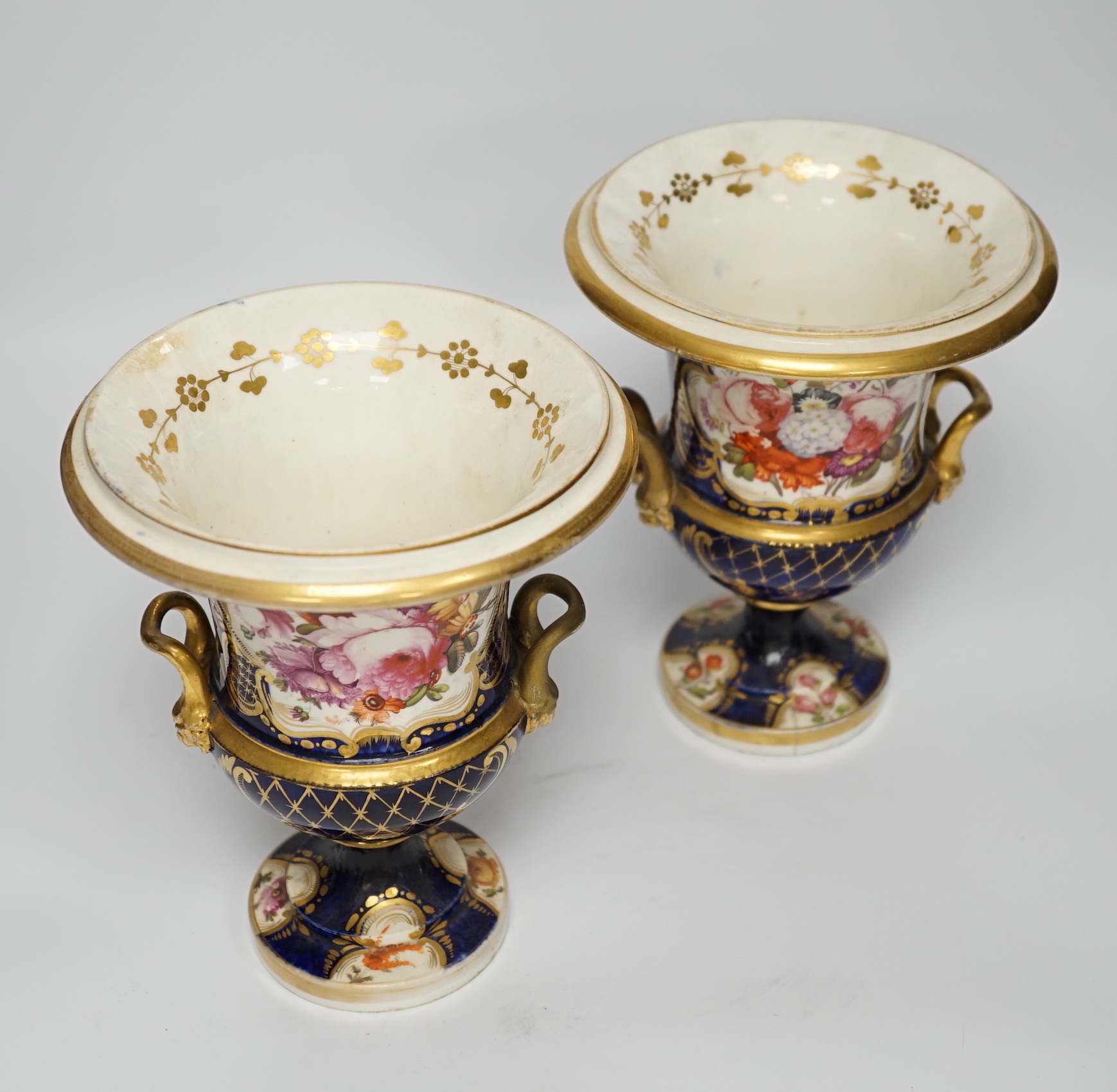 A pair of early 19th century English porcelain vases, scale blue ground, 19cm